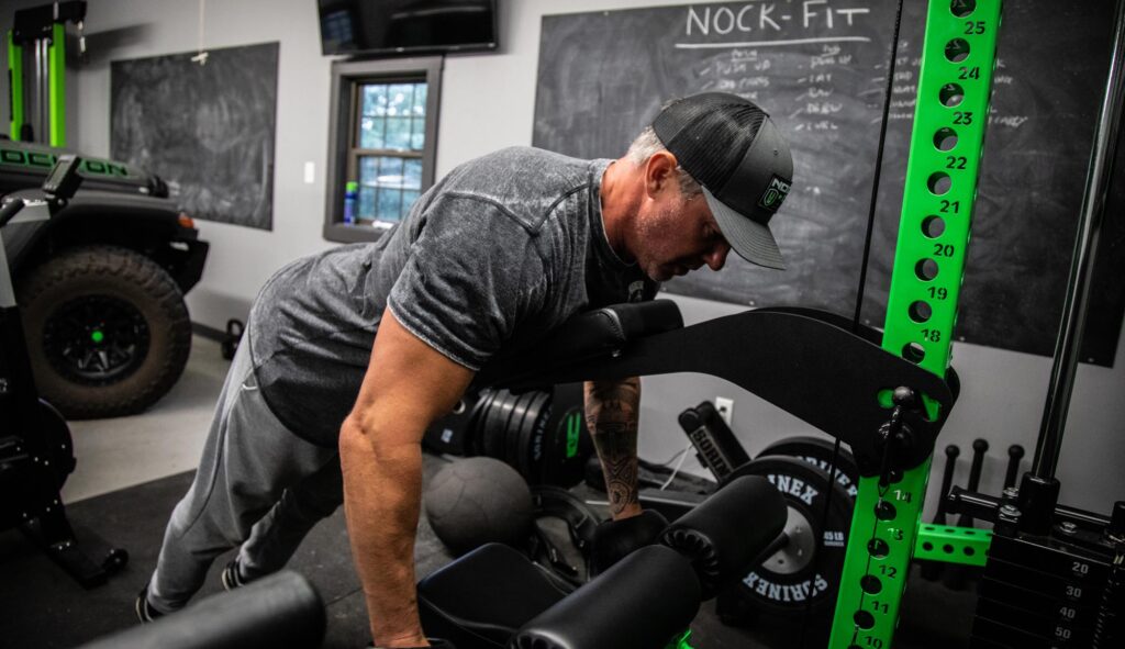 Nock Fit 2 Nock On Archery lifting weights on Sorinex Weight System