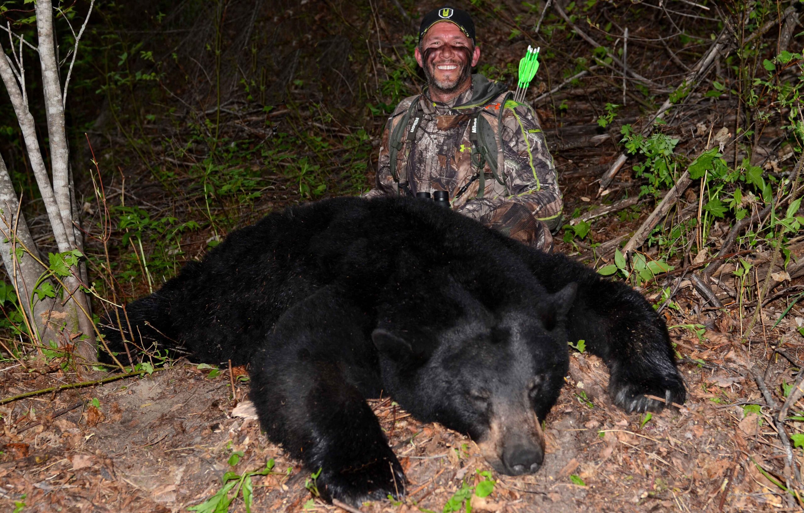 John Dudley with a spot and stalk bowhunting black bear