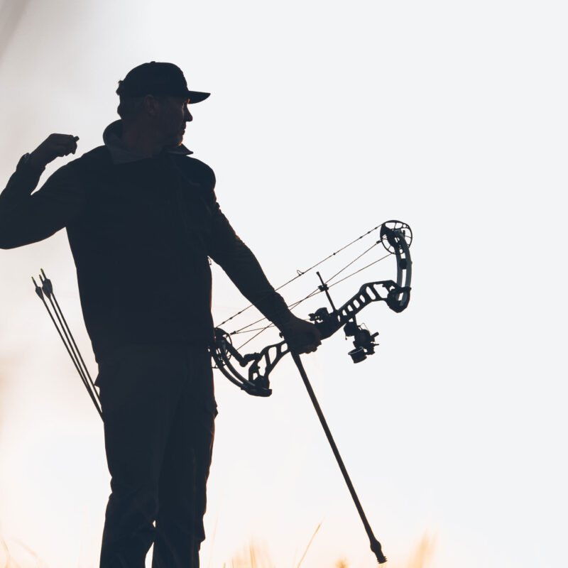 John Dudley showing the proper follow through with an archery release aid.