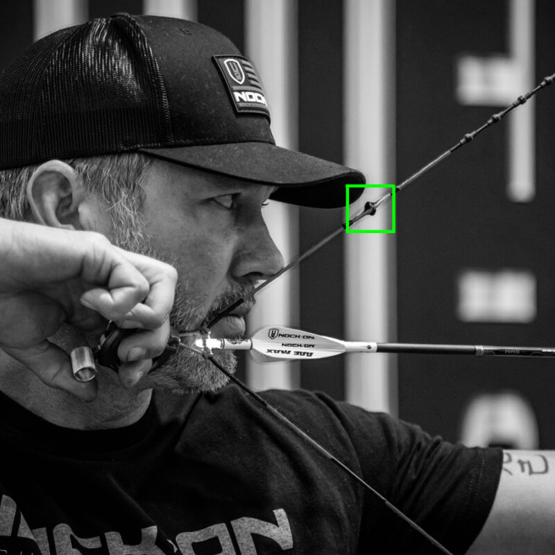 John Dudley of Nock On Archery showing proper peep sight location on a compound bow.
