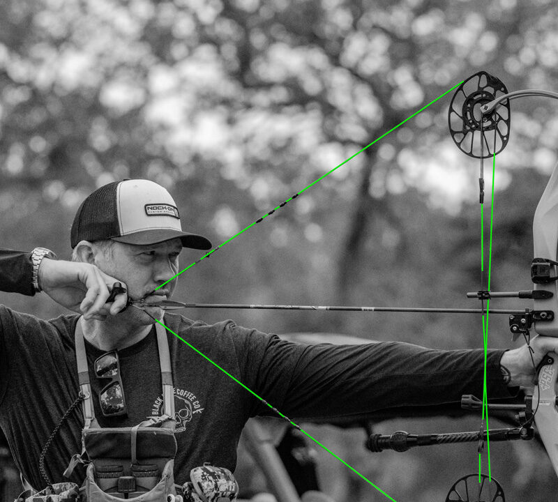 John Dudley at full draw with a clean bow string.