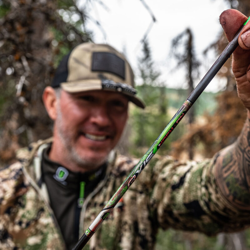 John Dudley holding an Easton Axis arrow that he used while bowhunting elk in Utah.