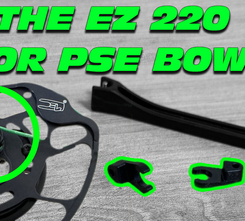 Pieces of the cam system on a PSE compound bow.